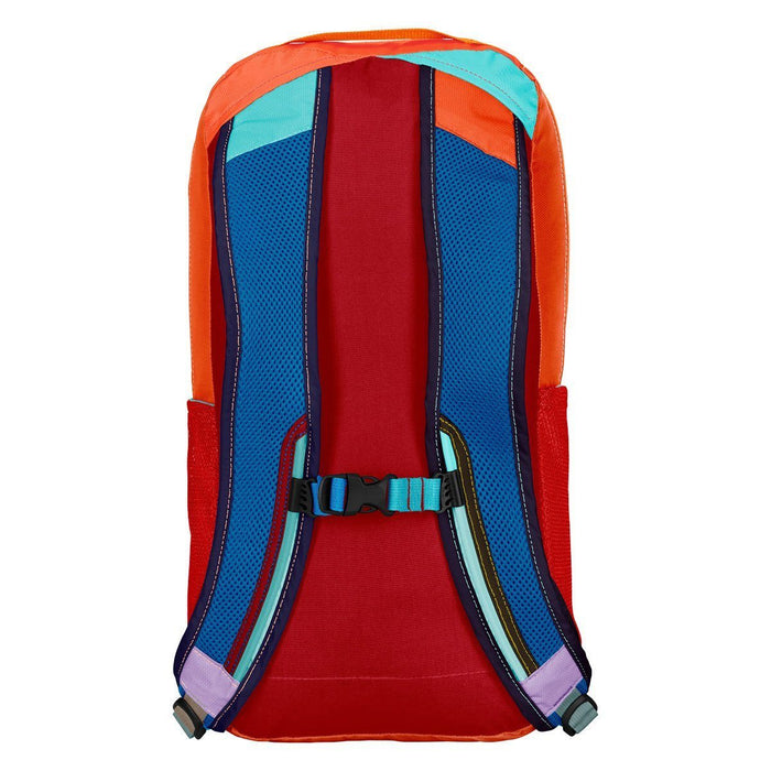 Detailed view of the Cotopaxi Batac backpack featuring vibrant straps and a red and blue color palette