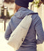 A person wearing a AmeriBag Healthy Back Bag in distressed nylon while dressed in casual attire