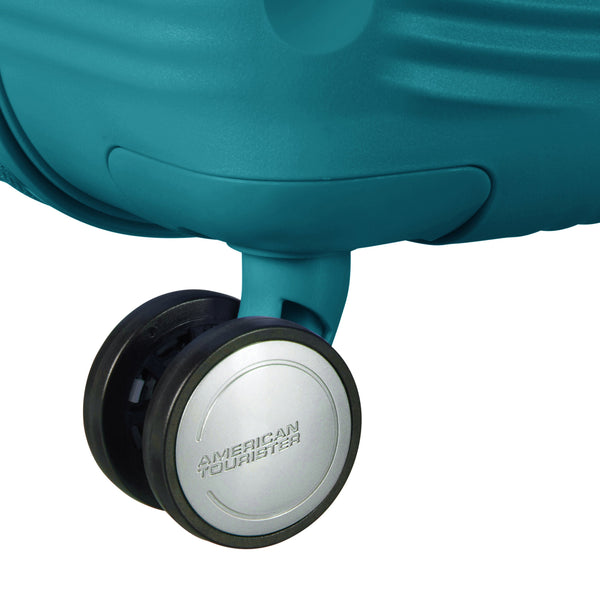 American Tourister Curio expandable spinner in turquoise color