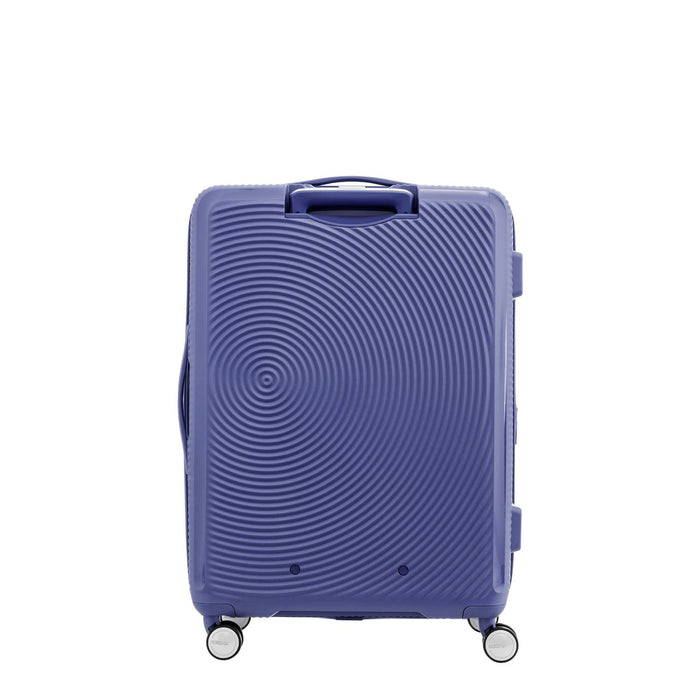 American Tourister Curio purple medium suitcase on white