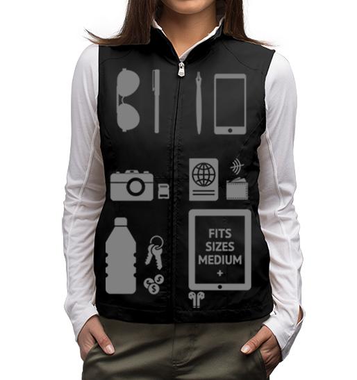Lifestyle shot of a woman wearing a ScotteVest equipped with various personal items
