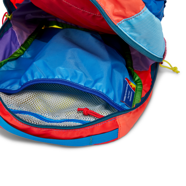 Cotopaxi Batac backpack highlighting the zipper compartment and colorful design