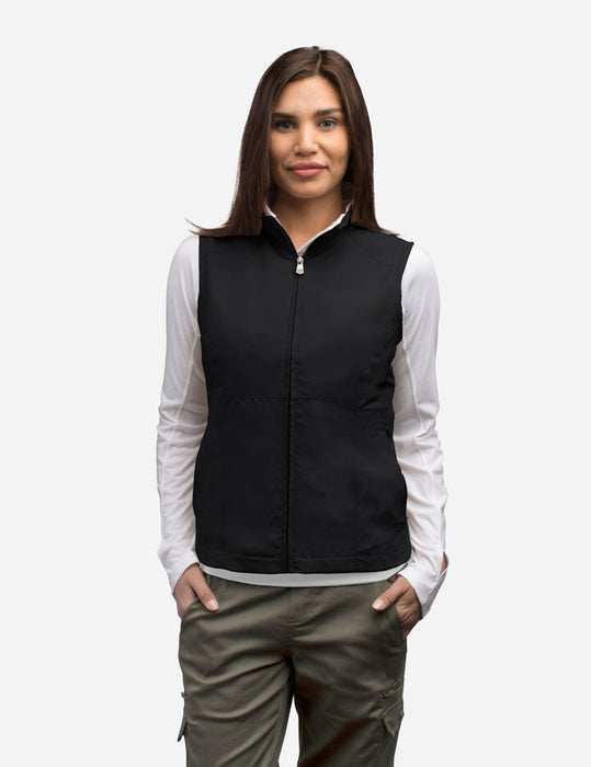 Women's ScotteVest highlighting the secure zipper pockets for valuables