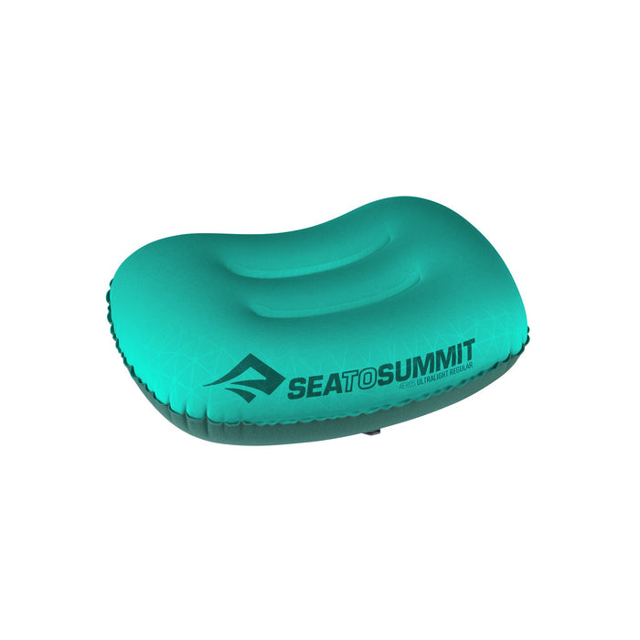 The Aeros Ultralight Travel Pillow displayed in a vibrant turquoise color