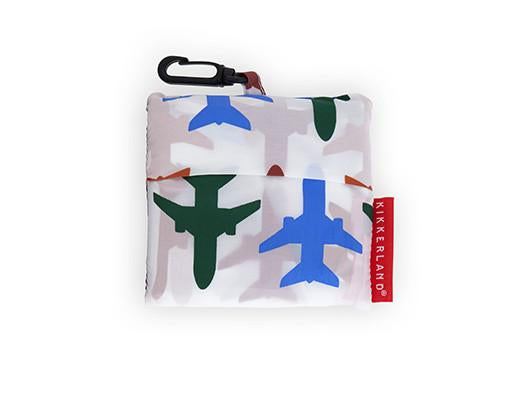 Laundry bag featuring a pattern of blue and green airplanes