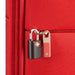 Red Samsonite Base Boost suitcase secured with a padlock
