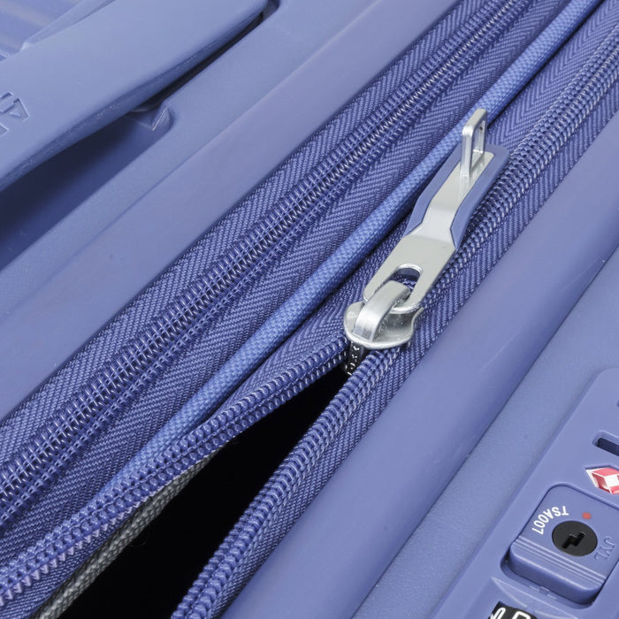 Close-up of American Tourister Curio blue suitcase's zipper and texture