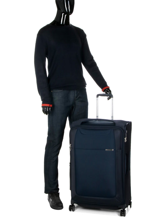 Display of Samsonite D'Lite Large Spinner with a mannequin dressed in black