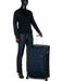Display of Samsonite D'Lite Large Spinner with a mannequin dressed in black