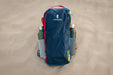 Cotopaxi Batac backpack resting on a sandy beach
